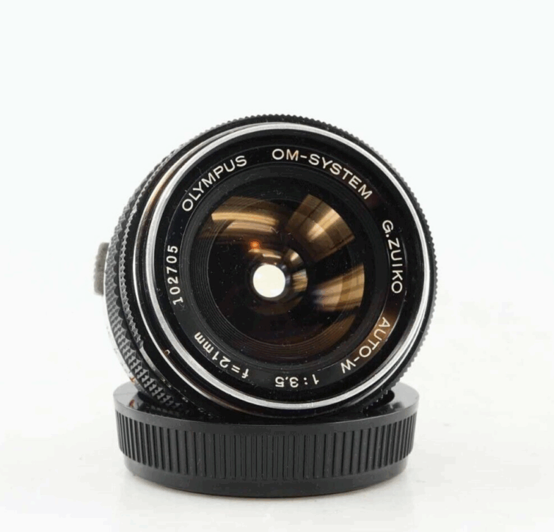 Olympus  OM System 21mm f3.5 Auto-W Zuiko Objektiv Lens 94273 - Image 1