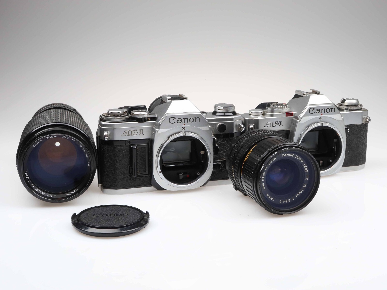 Canon-AE-1-und-AV-1-Kamera-Camera-Canon-FD-35-70mm-70-210mm-Objektiv-lens-97446-365567928569 Canon AE-1 und AV-1 Kamera Camera Canon FD 35-70mm 70-210mm Objektiv lens 97446 – Bild 1